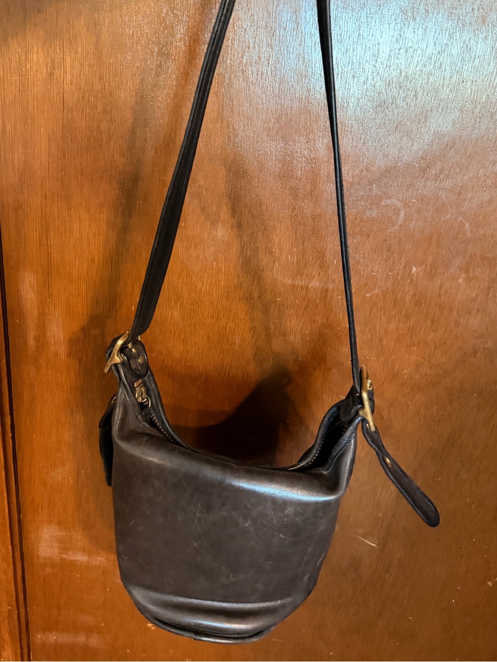 Coach Black Leather Crescent Shoulder Bag with Brass Accents